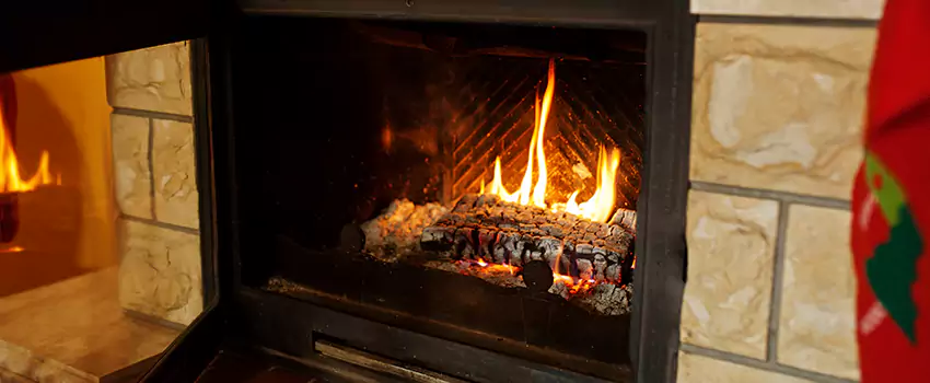 Commercial Prefabricated Fireplace Replacement in Magog, Quebec
