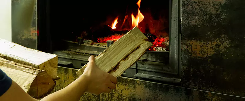 Wood Stove Heat Resistant Wall Repair in Magog, Quebec